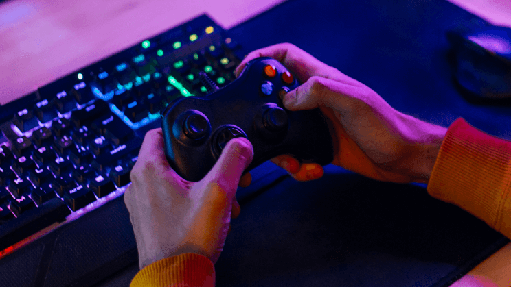 hands using a video game controller